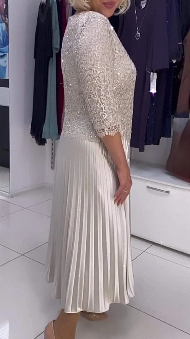 Dámské šaty s kulatým výstřihem a flitry