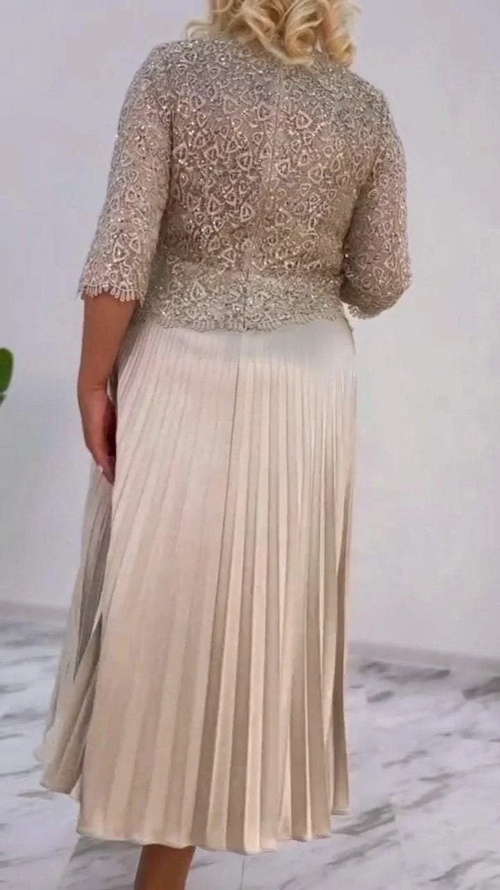 Dámské šaty s kulatým výstřihem a flitry