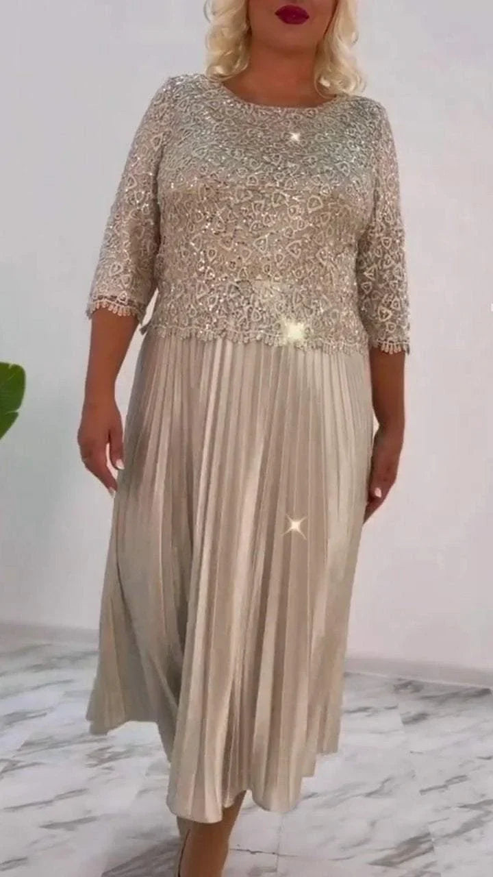 Dámské šaty s kulatým výstřihem a flitry