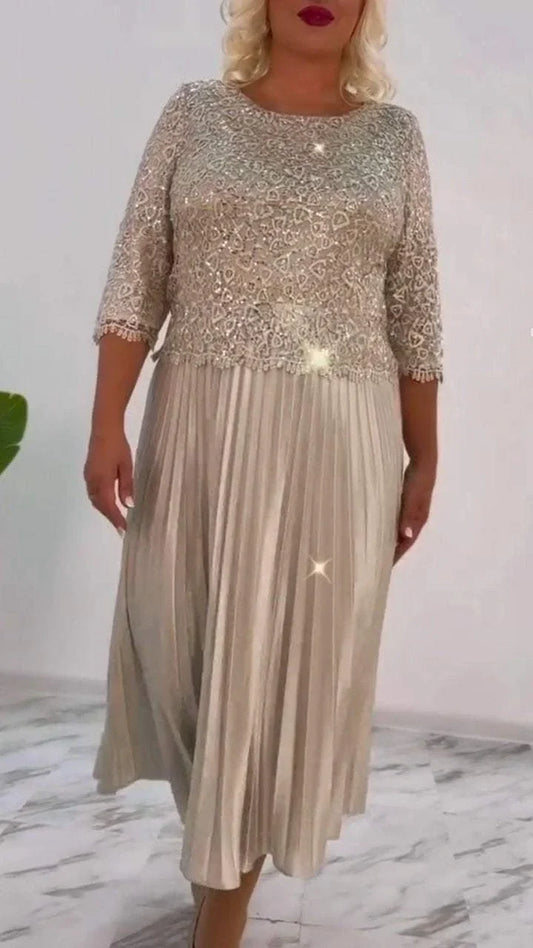 Dámské šaty s kulatým výstřihem a flitry