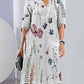Šaty s květinovým potiskem a dvojitým pasem