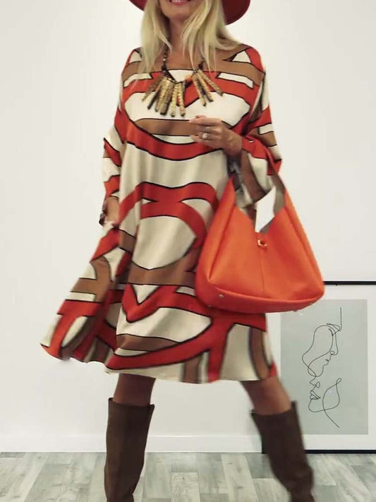 Volné šaty s potištěným kulatým výstřihem a dlouhými rukávy