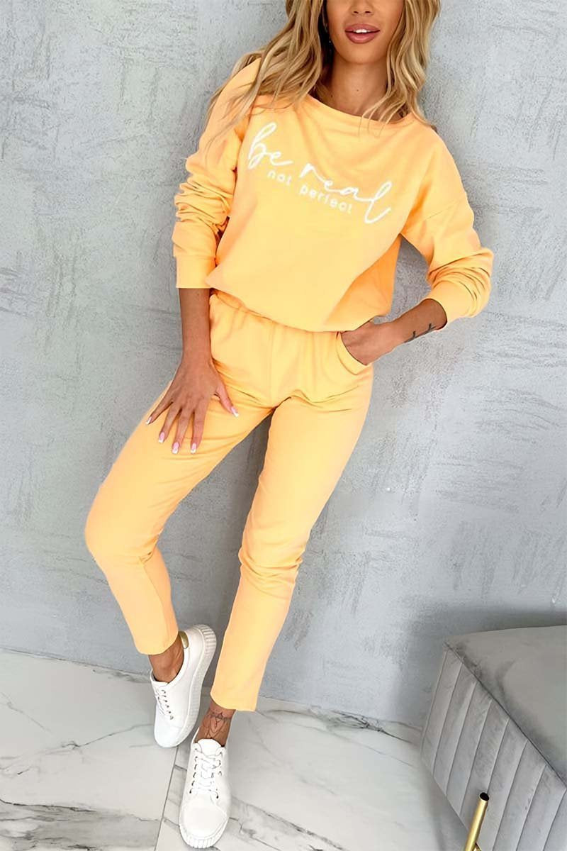 Dvoudílná souprava dámského topu a kalhot