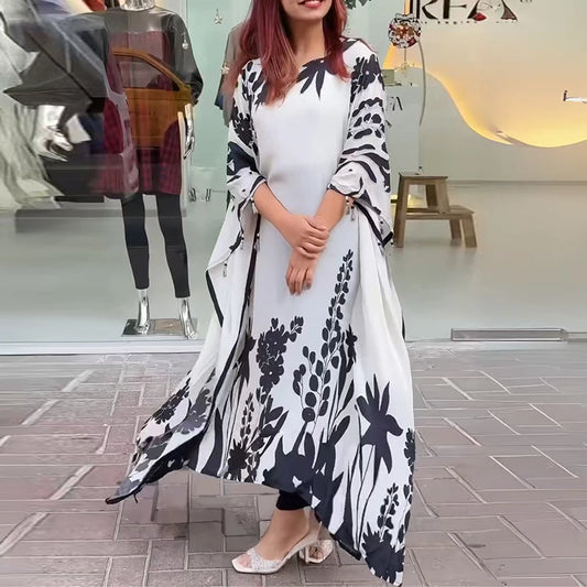 Elegantní volné bohémské šaty s kulatým výstřihem z roku 2025