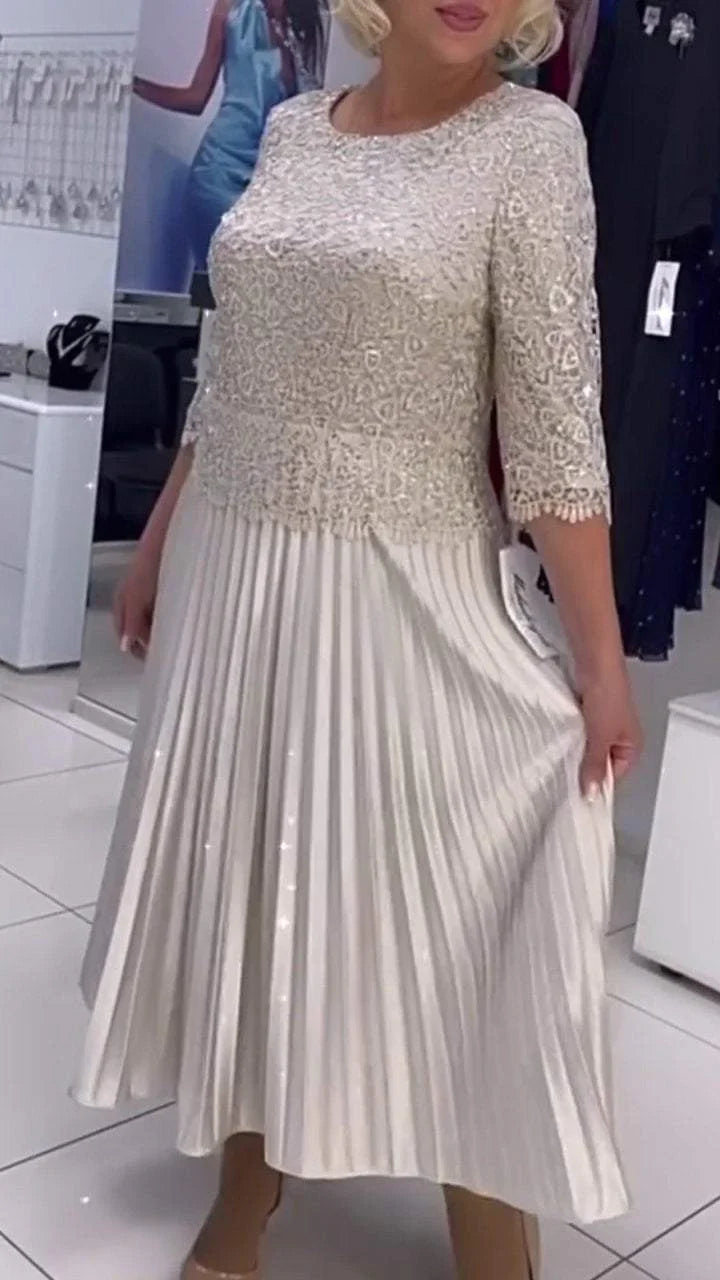 Dámské šaty s kulatým výstřihem a flitry