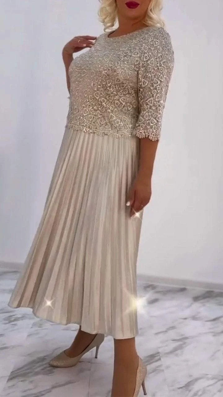 Dámské šaty s kulatým výstřihem a flitry