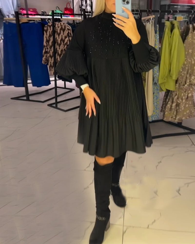 Šaty s balonovými rukávy a vysokým výstřihem