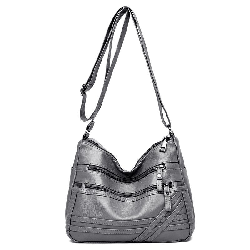 Dámská taška přes rameno z PU kůže s více kapsami proti krádeži