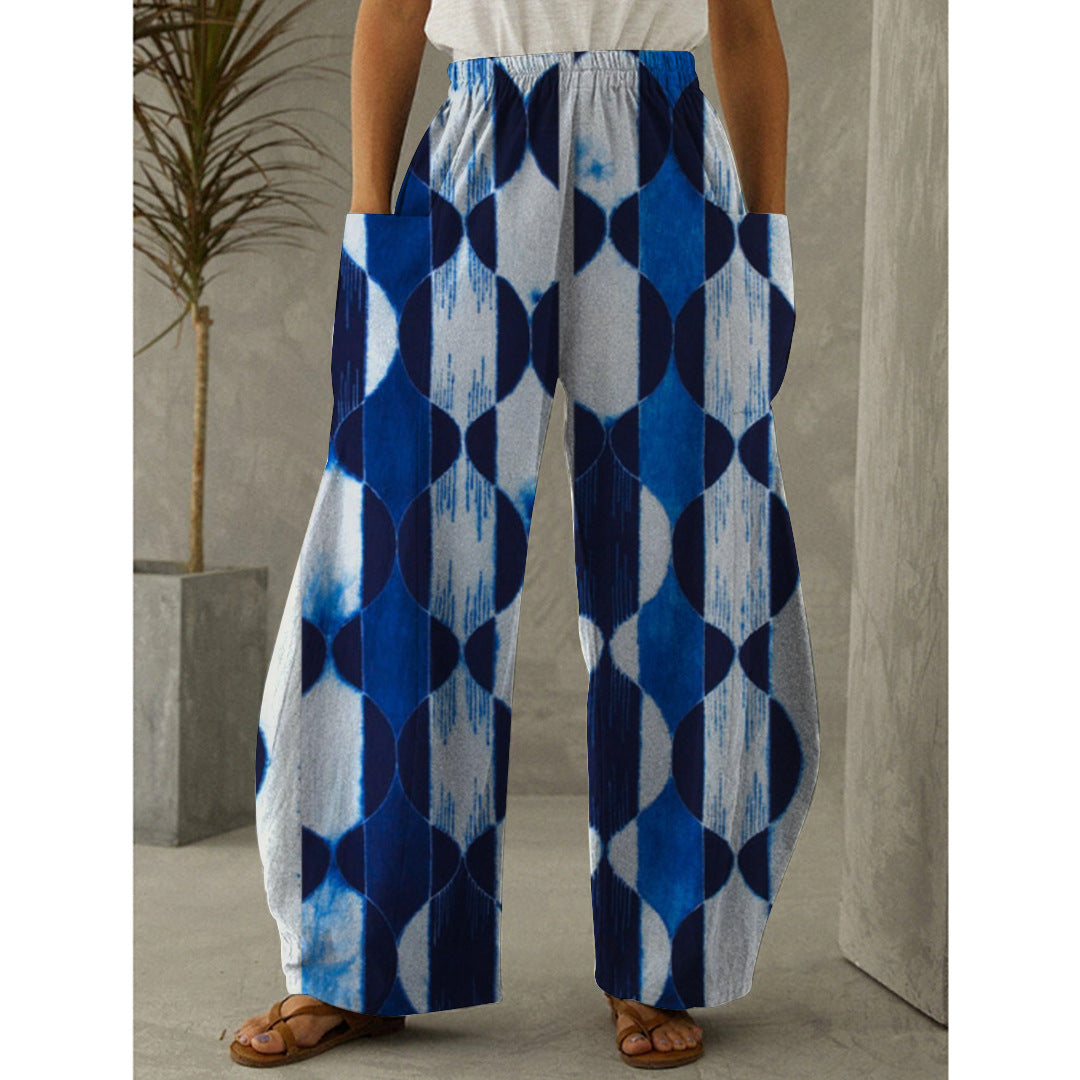 Široké kalhoty s rovným potiskem a vysokým pasem