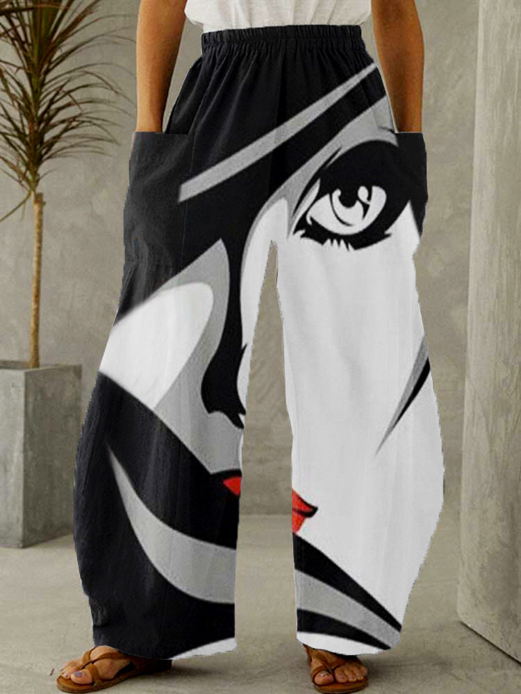 Široké kalhoty s rovným potiskem a vysokým pasem