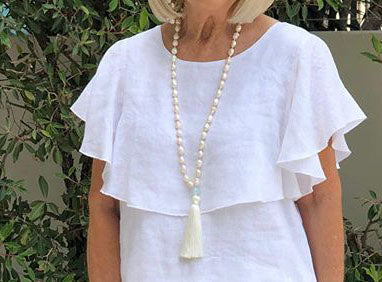 Romantické měkké bílé vrstvené šaty